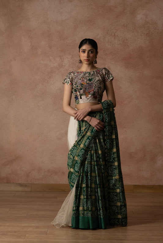 Off White Silk Blouse With Floral Lord Krishna Embroidery Paired With Organza Lehenga