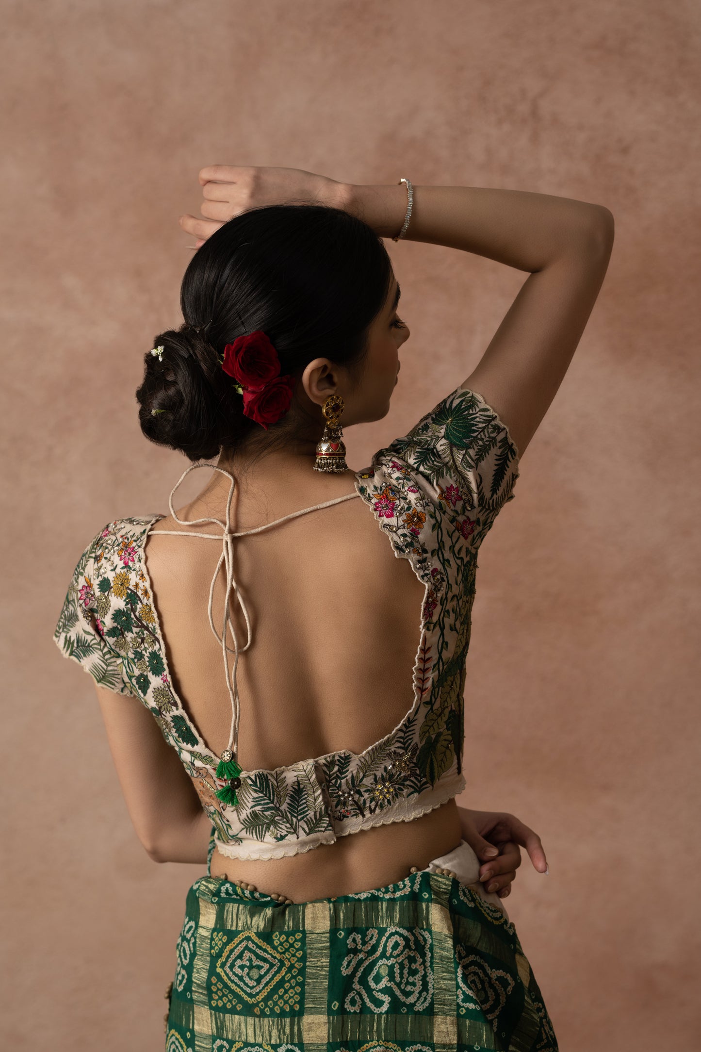 Off White Silk Blouse With Floral Lord Krishna Embroidery Paired With Organza Lehenga